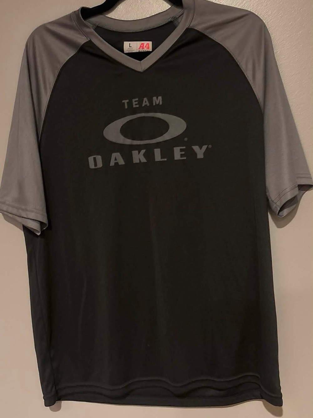 Oakley Black and Gray Team Logo V-Neck Performance Shirt